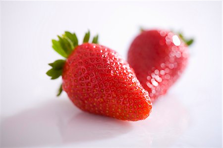 simsearch:659-01866279,k - Two strawberries Stock Photo - Premium Royalty-Free, Code: 659-03522479