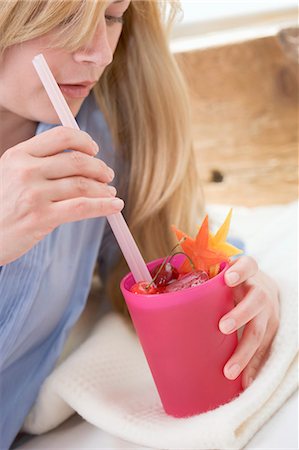 simsearch:659-03523361,k - Blond woman with a fruit cocktail Stock Photo - Premium Royalty-Free, Code: 659-03522514