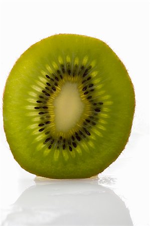 simsearch:659-02213458,k - A slice of kiwi fruit Foto de stock - Sin royalties Premium, Código: 659-03522697