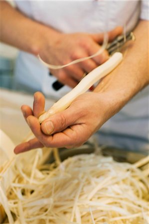 restaurant kitchen - Peeling white asparagus Stock Photo - Premium Royalty-Free, Code: 659-03522804