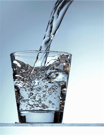 simsearch:659-01861400,k - Pouring water into a glass Stock Photo - Premium Royalty-Free, Code: 659-03522880