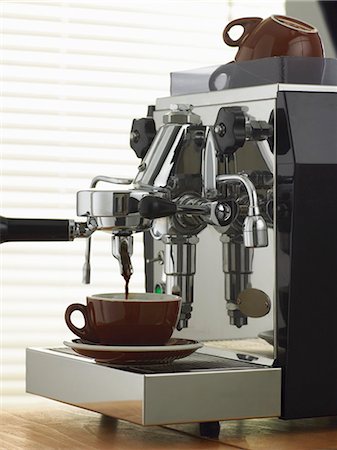 simsearch:659-08419886,k - Espresso running out of chromium-plated espresso machine into cup Stock Photo - Premium Royalty-Free, Code: 659-03522897