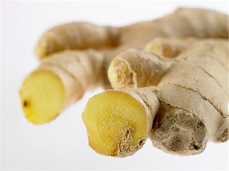 fresh ginger - Ginger root showing cut surfaces Stock Photo - Premium Royalty-Free, Code: 659-03522905