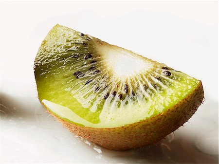 simsearch:659-01843575,k - A wedge of kiwi fruit Stock Photo - Premium Royalty-Free, Code: 659-03523005