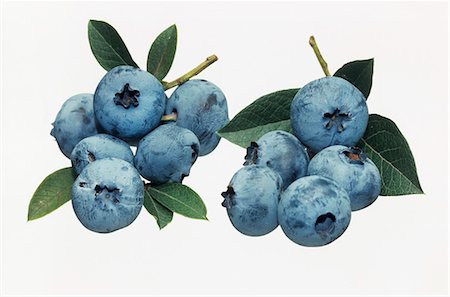 Blueberries with leaves Foto de stock - Sin royalties Premium, Código: 659-03523079