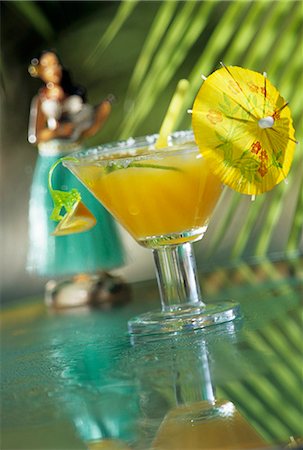 simsearch:659-06154187,k - Tropical Rum Cocktail in a Glass with Cocktail Umbrella Stock Photo - Premium Royalty-Free, Code: 659-03523239