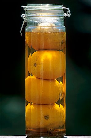Jar of Homemade Orange Liqueur Stock Photo - Premium Royalty-Free, Code: 659-03523245