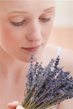Young woman with dried lavender Stock Photo - Premium Royalty-Free, Code: 659-03523432