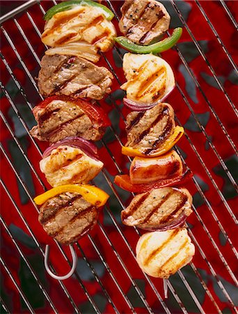 skewer bbq nobody - Loin of pork on skewers on a barbecue Stock Photo - Premium Royalty-Free, Code: 659-03523469