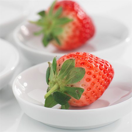simsearch:659-01866279,k - Whole strawberries in small white dishes Stock Photo - Premium Royalty-Free, Code: 659-03523463