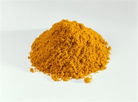 A heap of curry powder Stock Photo - Premium Royalty-Free, Code: 659-03523481