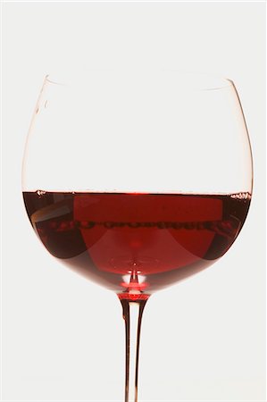 A glass of red wine Foto de stock - Sin royalties Premium, Código: 659-03523499