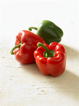 Two red peppers and one green pepper Stock Photo - Premium Royalty-Free, Code: 659-03523619