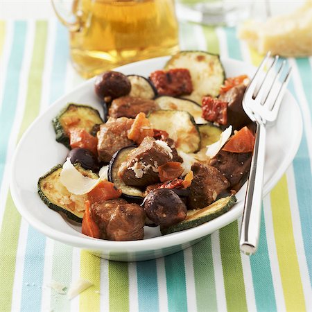 simsearch:659-03534175,k - Pork with roasted vegetables on a platter Stock Photo - Premium Royalty-Free, Code: 659-03523626