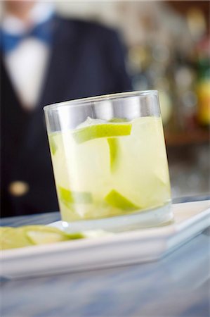 simsearch:659-03524397,k - A glass of lime drink with ice cubes Stock Photo - Premium Royalty-Free, Code: 659-03523679