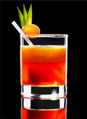 simsearch:659-03523705,k - An orange cocktail Foto de stock - Sin royalties Premium, Código: 659-03523699