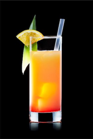 picture of alcohol with a black background - Tequila Sunrise Stock Photo - Premium Royalty-Free, Code: 659-03523713