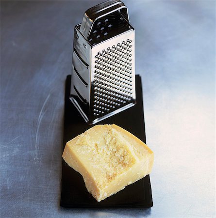 rallador - Parmesan with grater Foto de stock - Sin royalties Premium, Código: 659-03523907