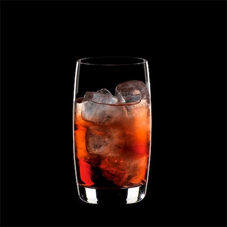 softdrink - A glass of Campari Soda with ice cubes Stock Photo - Premium Royalty-Free, Code: 659-03534013