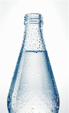 drinking water glass bottles - Bottle of water (detail) Stock Photo - Premium Royalty-Free, Code: 659-03534078