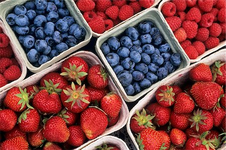 strawberries many - Strawberries, blueberries & raspberries in cardboard punnets Stock Photo - Premium Royalty-Free, Code: 659-03534188