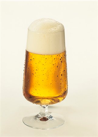 simsearch:659-08904564,k - A glass of pils Stock Photo - Premium Royalty-Free, Code: 659-03534318