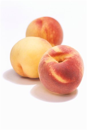 fresh peach - Three peaches Stock Photo - Premium Royalty-Free, Code: 659-03534325