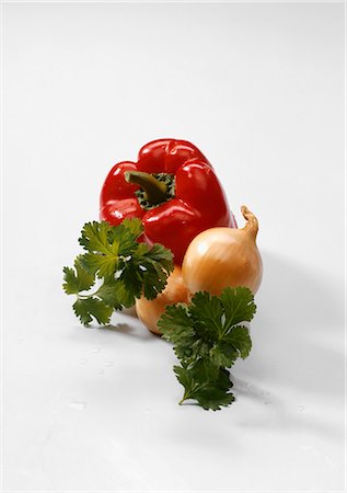 Two onions, one red pepper and flat-leaf parsley Stock Photo - Premium Royalty-Free, Code: 659-03534595
