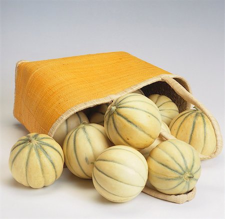 sweet melon - Charentais melons in and spilling out of bag Stock Photo - Premium Royalty-Free, Code: 659-03534646