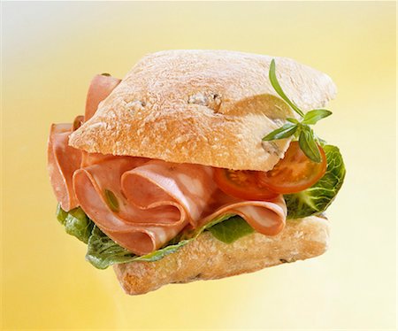 european cuisine - Italian mortadella, lettuce and tomato in ciabatta Stock Photo - Premium Royalty-Free, Code: 659-03534725