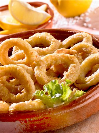 siba (tipo de molusco) - Deep-fried squid rings Foto de stock - Royalty Free Premium, Número: 659-03534768