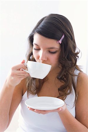 Girl drinking tea Stock Photo - Premium Royalty-Free, Code: 659-03534822