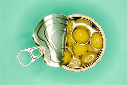 Opened tin of olives in oil Stock Photo - Premium Royalty-Free, Code: 659-03534855
