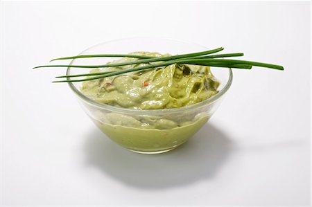 Guacamole in a dish with chives Stock Photo - Premium Royalty-Free, Code: 659-03534866