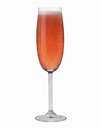 flûte à champagne - Un verre de rosé mousseux Photographie de stock - Premium Libres de Droits, Code: 659-03534892