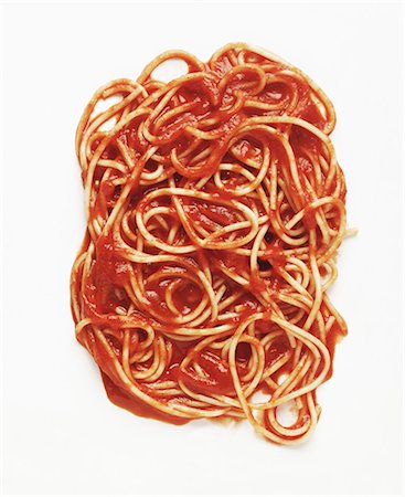 Pasta with Tomato Sauce on a White Background Stock Photo - Premium Royalty-Free, Code: 659-03535082
