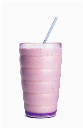 simsearch:659-03537278,k - Fruit Smoothie in a Glass with a Straw; White Background Foto de stock - Sin royalties Premium, Código: 659-03535096