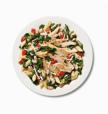 food top view italian - Tuscan Chicken Dish with Pasta and White Beans Stock Photo - Premium Royalty-Free, Code: 659-03535103