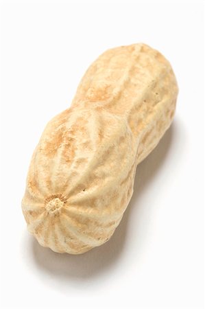 One unshelled peanut Foto de stock - Sin royalties Premium, Código: 659-03535118