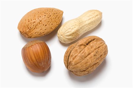 Almond, hazelnut, peanut and walnut Foto de stock - Sin royalties Premium, Código: 659-03535129
