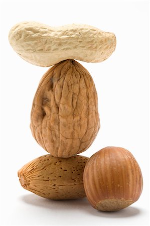 simsearch:659-06187916,k - Assorted nuts, some stacked Stock Photo - Premium Royalty-Free, Code: 659-03535130