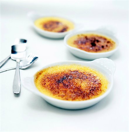 Three dishes with creme brulee Stock Photo - Premium Royalty-Free, Code: 659-03535208