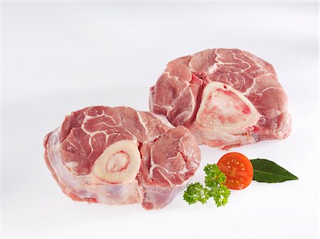 Slices of raw veal shank Stock Photo - Premium Royalty-Free, Code: 659-03535274