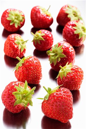 simsearch:659-01866279,k - Several fresh strawberries Stock Photo - Premium Royalty-Free, Code: 659-03535294