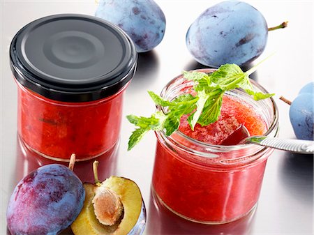 Two jars of plum jam and fresh plums Stock Photo - Premium Royalty-Free, Code: 659-03535300