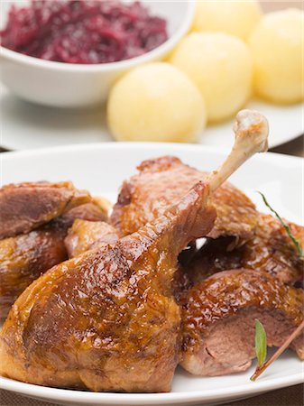 roast poultry - Duck with red cabbage and potato dumplings Stock Photo - Premium Royalty-Free, Code: 659-03535330