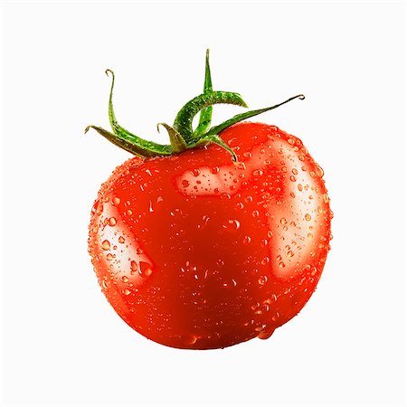 simsearch:659-06307625,k - A tomato with drops of water Stock Photo - Premium Royalty-Free, Code: 659-03535372