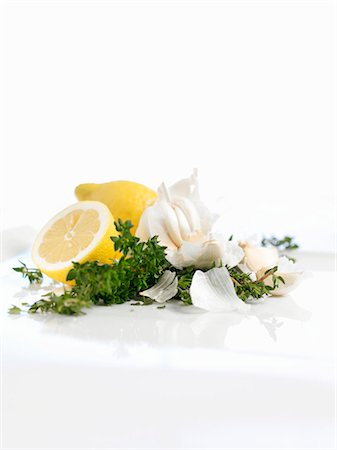 food still life - Garlic, thyme and lemons Stock Photo - Premium Royalty-Free, Code: 659-03535441
