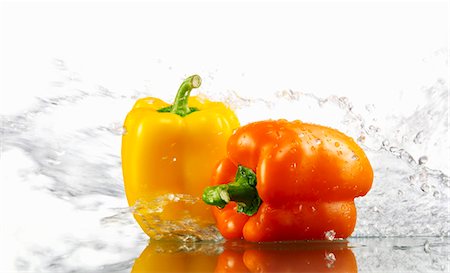 Yellow and orange peppers with splashing water Stock Photo - Premium Royalty-Free, Code: 659-03535732