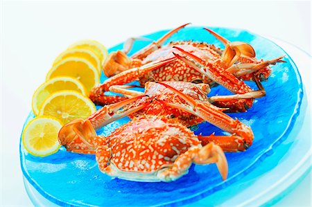 Crabs with lemon slices, Thailand Foto de stock - Sin royalties Premium, Código: 659-03535775